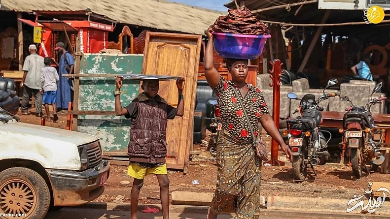 (تصاویر) زندگی دشوار زنان در گینه